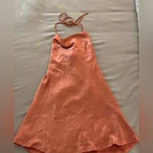 New with tags!! Hello molly halter dress! Such a cute silky dress!